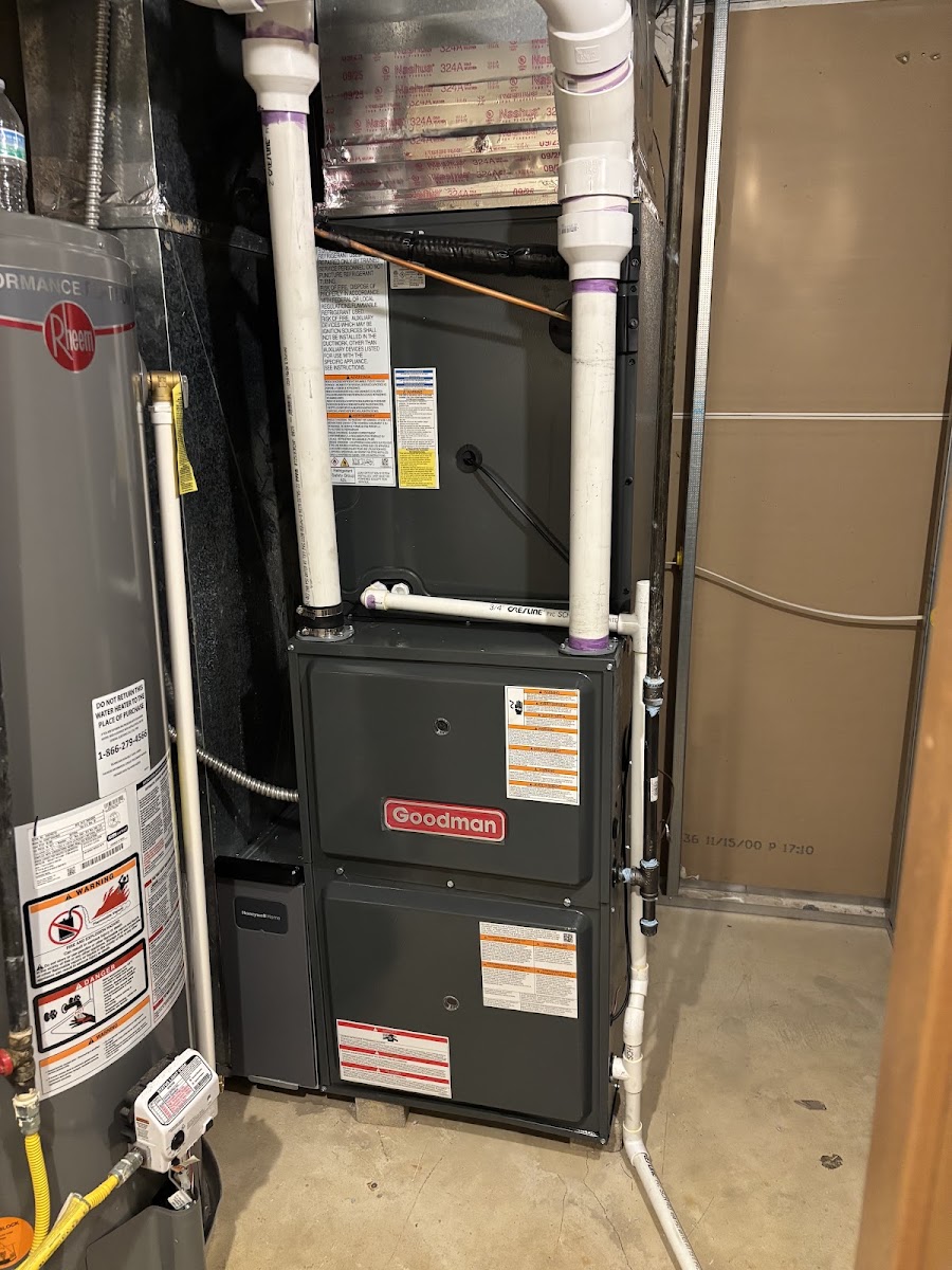 New Goodman furnace installed in a home utility closet